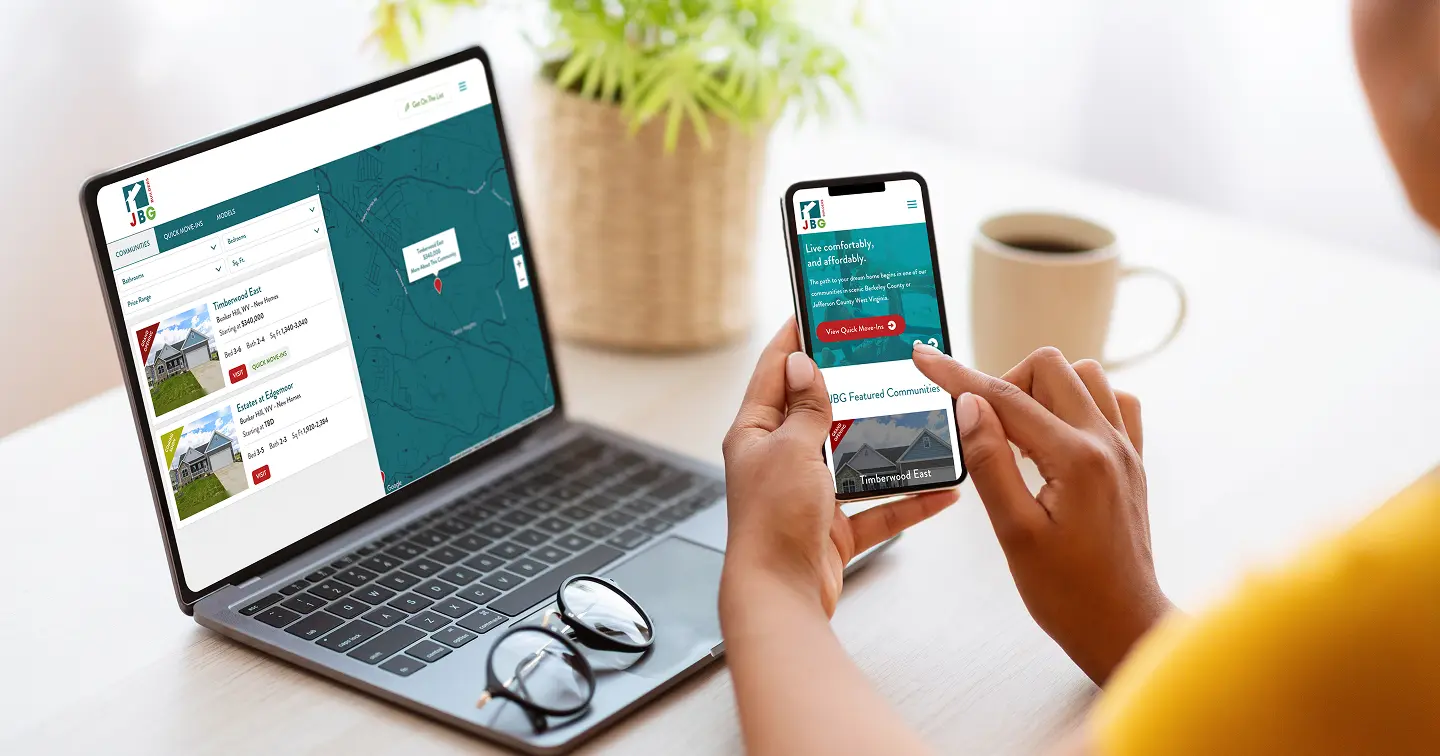 JBG Builderswebsite on a laptop, tablet, and mobile phone